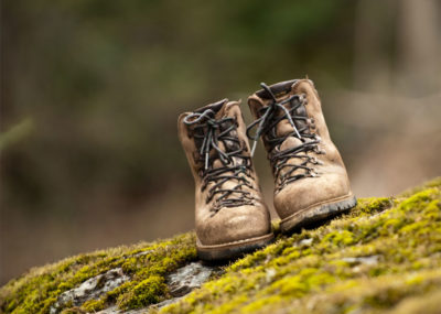 Danner Boots on rock with moss photo by Eric Morley