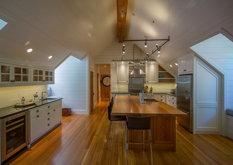 heart pine reclaimed wood kitchen with nickel gap painted white ceiling boards