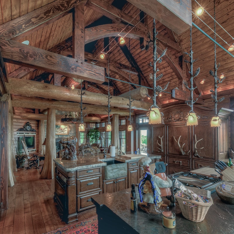 Rustic kitchen with Bald Cypress buttress logs and timber framing