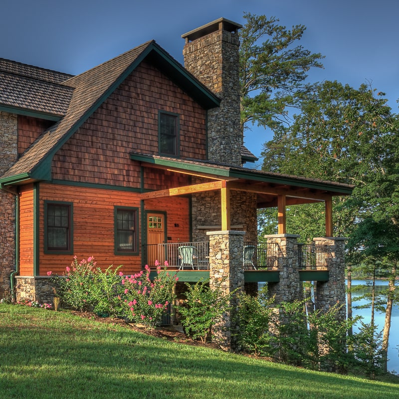 Timber frame wrap around porch on Lake James