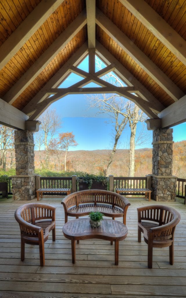 Timber frame scissor trusses on a covered deck