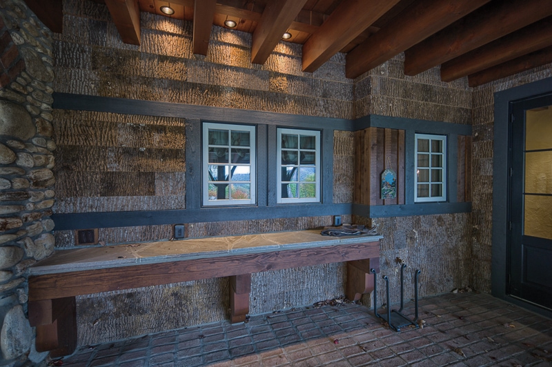 post and beam porch with poplar bark siding