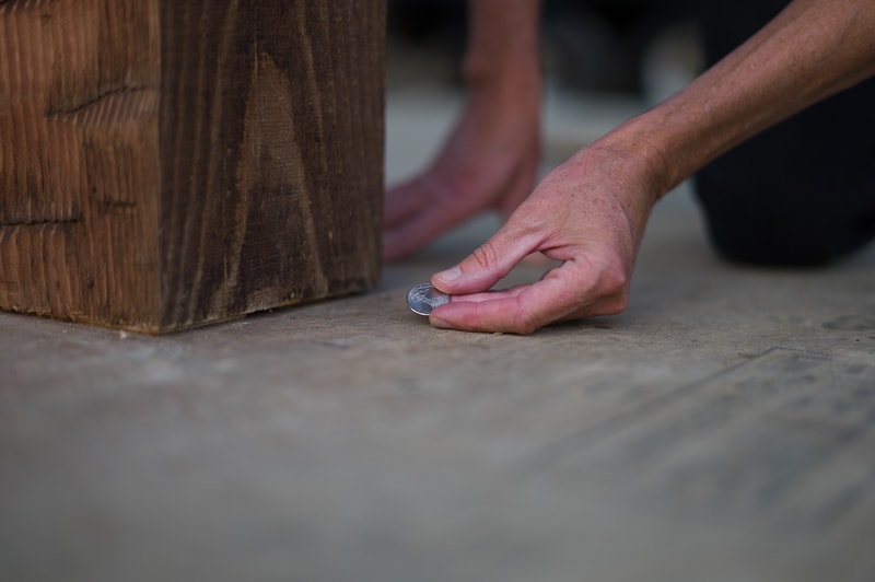 placing a coin under a post